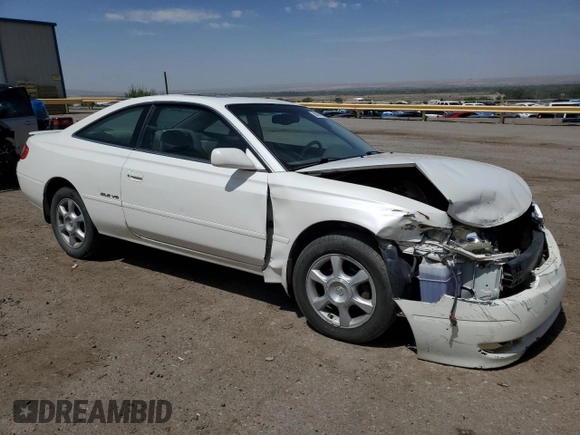 2002 Toyota Solara SE with VIN 2T1CF28P82C601593, listed as a Copart auction lot 60487005 with 137,624 mi miles and Salvage title. Bid and sale history available at DreamBid. Image 4.