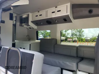 2022 Ford Transit with VIN 1FDRU8UG5NKA33889, listed as a Copart auction lot 55999664 with 23,149 mi miles and Salvage Title. Bid and sale history available at DreamBid. Image 11.