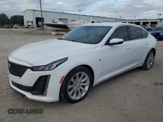 2023 Cadillac CT5 Luxury z VIN 1G6DM5RK9P0130881, wystawiony jako Copart lot #84156054 z przebiegiem Nie podano mil oraz Szkoda całkowita • Salvage title. Historia ofert i sprzedaży dostępna na DreamBid. Obrazek 1.