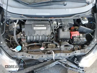 2010 Honda Insight LX with VIN JHMZE2H54AS021815, listed as a IAAI auction lot 42259951 with 137,436 mi miles and . Bid and sale history available at DreamBid. Image 10.
