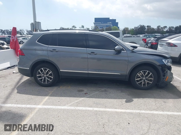2020 Volkswagen Tiguan SE with VIN 3VV3B7AX9LM061569, listed as a IAAI auction lot 41902252 with 33,079 mi miles and . Bid and sale history available at DreamBid. Image 13.