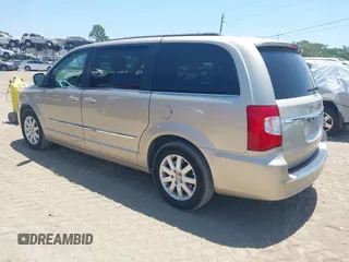 2014 Chrysler Town & Country Touring with VIN 2C4RC1BG3ER418600, listed as a IAAI auction lot 42132277 with 72,406 mi miles and . Bid and sale history available at DreamBid. Image 3.