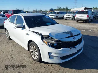 2016 Kia Optima LX with VIN 5XXGT4L36GG005859, listed as a IAAI auction lot 41053277 with 127,783 mi miles. Bid and sale history available at carsss.com. Image 1.