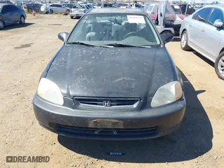 1997 Honda Civic DX with VIN 1HGEJ6120VL048384, listed as a IAAI auction lot 41866628 with 286,599 mi miles. Bid and sale history available at carsss.com. Image 6.