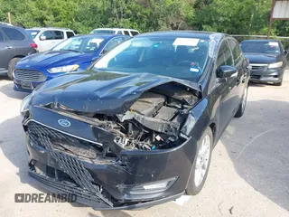 2015 Ford Focus SE with VIN 1FADP3F29FL384591, listed as a IAAI auction lot 42537981 with 49,735 mi miles and . Bid and sale history available at DreamBid. Image 6.