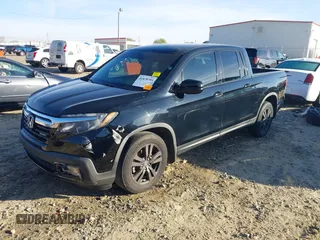 2019 Honda Ridgeline Sport with VIN 5FPYK2F12KB007990, listed as a IAAI auction lot 41828709 with 67,736 mi miles and . Bid and sale history available at DreamBid. Image 2.