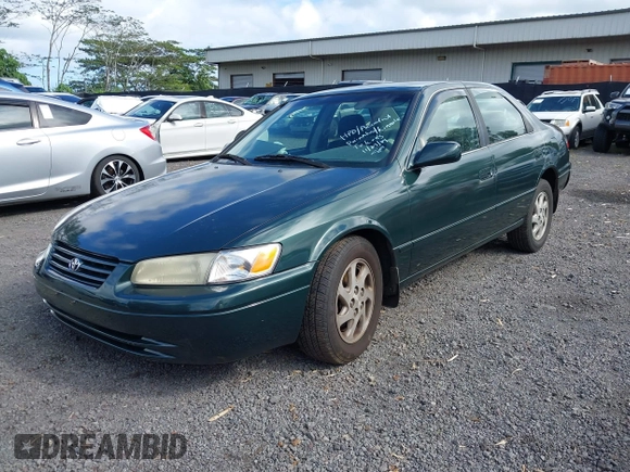 1999 Toyota Camry LE z VIN JT2BF22K2X0164080, wystawiony jako IAAI lot #40984874 z przebiegiem Nie podano mil oraz . Historia ofert i sprzedaży dostępna na DreamBid. Obrazek 2.