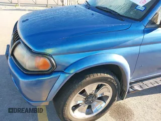 2003 Mitsubishi Montero XLS z VIN JA4MT31R13J045223, wystawiony jako IAAI lot #42208271 z przebiegiem 188 068 mil mil oraz . Historia ofert i sprzedaży dostępna na DreamBid. Obrazek 14.