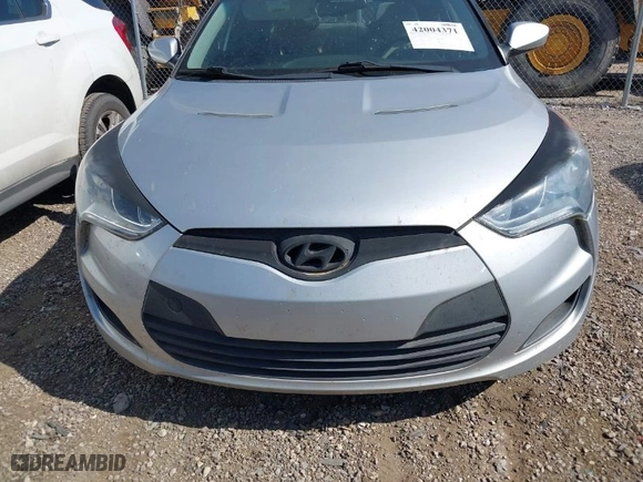 2012 Hyundai Veloster w/Black Int with VIN KMHTC6AD4CU021595, listed as a IAAI auction lot 42004371 with 149,637 mi miles. Bid and sale history available at carsss.com. Image 6.