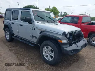 2022 Jeep Wrangler Unlimited Willys Sport with VIN 1C4HJXDM4NW175782, listed as a IAAI auction lot 42073544 with 129,299 mi miles and . Bid and sale history available at DreamBid. Image 1.