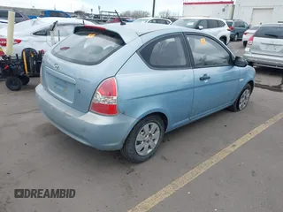 2007 Hyundai Accent GS with VIN KMHCM36CX7U006584, listed as a IAAI auction lot 41801452 with 1 mi miles. Bid and sale history available at carsss.com. Image 4.