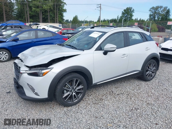 2017 Mazda CX-3 Grand Touring z VIN JM1DKFD70H0159621, wystawiony jako IAAI lot #42331482 z przebiegiem 55 166 mil mil oraz . Historia ofert i sprzedaży dostępna na DreamBid. Obrazek 2.