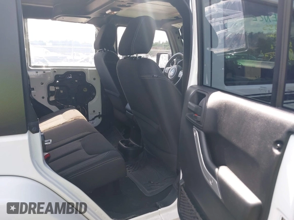 2015 Jeep Wrangler Unlimited Sahara with VIN 1C4HJWEG6FL556460, listed as a IAAI auction lot 42066648 with 54,747 mi miles. Bid and sale history available at carsss.com. Image 8.