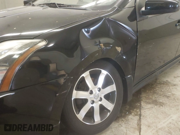 2011 Nissan Sentra SR with VIN 3N1AB6AP0BL723742, listed as a IAAI auction lot 42023638 with 101,520 mi miles and . Bid and sale history available at DreamBid. Image 6.
