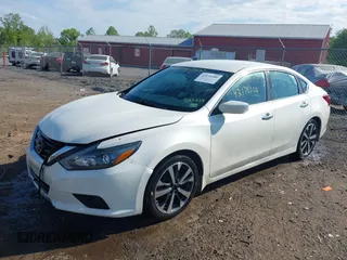 2017 Nissan Altima SV z VIN 1N4AL3AP0HC125959, wystawiony jako IAAI lot #42176500 z przebiegiem 146 838 mil mil oraz . Historia ofert i sprzedaży dostępna na DreamBid. Obrazek 17.