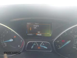 2015 Ford Focus Titanium with VIN 1FADP3J24FL385526, listed as a IAAI auction lot 42011712 with 162,696 mi miles and . Bid and sale history available at carsss.com. Image 7.
