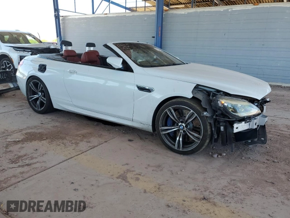 2013 BMW M6 с VIN WBSLZ9C59DDZ77823, выставлен на аукционе Copart как лот 62354225 с пробегом 74 704 миль миль и Списание • Salvage title. История ставок и продаж доступна на DreamBid. Изображение 4.