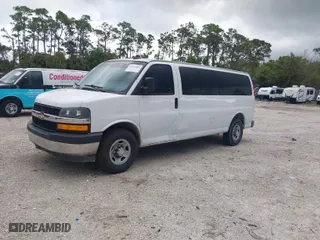 2018 Chevrolet Express Passenger LT with VIN 1GAZGPFG7J1334935, listed as a IAAI auction lot 41697084 with 72,571 mi miles. Bid and sale history available at carsss.com. Image 2.
