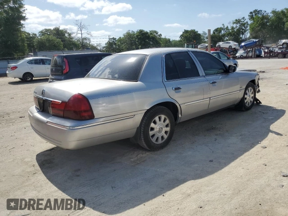 2003 Mercury Grand Marquis LS Premium with VIN 2MEHM75W63X697725, listed as a Copart auction lot 54485505 with 129,194 mi miles and Salvage Title. Bid and sale history available at DreamBid. Image 3.