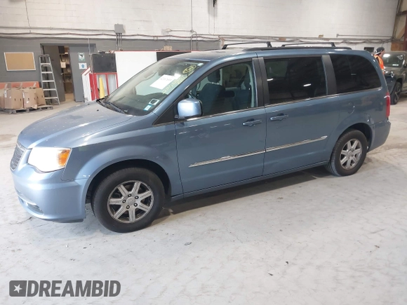 2011 Chrysler Town & Country Touring with VIN 2A4RR5DG4BR779844, listed as a IAAI auction lot 42167693 with 272,502 mi miles and . Bid and sale history available at DreamBid. Image 2.