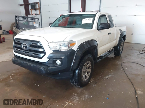 2016 Toyota Tacoma SR z VIN 5TFSX5ENXGX042148, wystawiony jako IAAI lot #41592688 z przebiegiem 126 528 mil mil oraz . Historia ofert i sprzedaży dostępna na DreamBid. Obrazek 2.