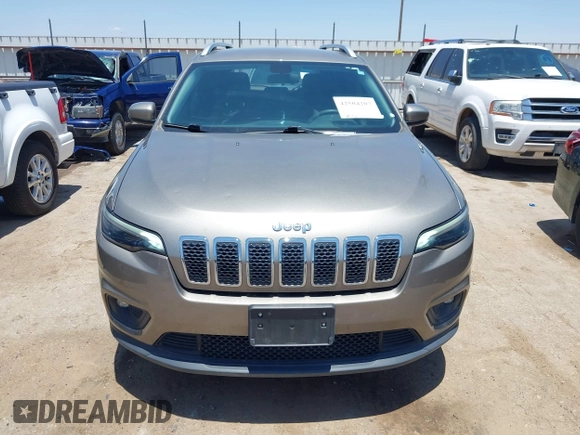 2019 Jeep Cherokee Latitude with VIN 1C4PJLCB7KD365667, listed as a IAAI auction lot 42504207 with 68,106 mi miles and . Bid and sale history available at DreamBid. Image 12.