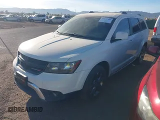 2017 Dodge Journey Crossroad Plus z VIN 3C4PDCGG4HT575546, wystawiony jako IAAI lot #41477700 z przebiegiem 176 968 mil mil oraz . Historia ofert i sprzedaży dostępna na DreamBid. Obrazek 17.