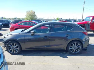2018 Mazda 3 Touring with VIN 3MZBN1L34JM164952, listed as a IAAI auction lot 42179420 with 106,706 mi miles and . Bid and sale history available at DreamBid. Image 14.