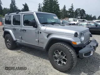 2018 Jeep Wrangler Unlimited Sahara with VIN 1C4HJXEG9JW231976, listed as a Copart auction lot 62427345 with 54,127 mi miles and Salvage title. Bid and sale history available at DreamBid. Image 4.