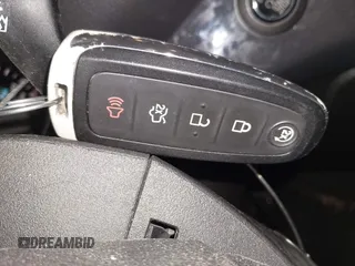 2014 Ford Escape Titanium with VIN 1FMCU9J9XEUE26857, listed as a IAAI auction lot 41552186 with 142,045 mi miles. Bid and sale history available at carsss.com. Image 11.