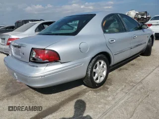 2002 Mercury Sable LS z VIN 1MEHM55SX2A619019, wystawiony jako Copart lot #74205254 z przebiegiem 71 677 mil mil oraz Szkody całkowita. Historia ofert i sprzedaży dostępna na DreamBid. Obrazek 3.