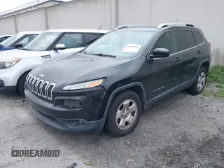 2015 Jeep Cherokee Latitude with VIN 1C4PJLCB9FW627909, listed as a IAAI auction lot 42034667 with 131,739 mi miles and . Bid and sale history available at carsss.com. Image 2.