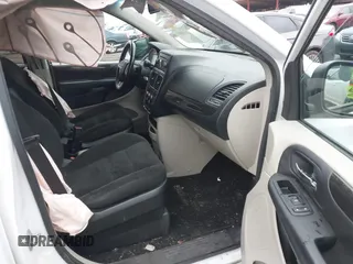 2017 Dodge Grand Caravan SE with VIN 2C4RDGBG9HR824594, listed as a IAAI auction lot 41250877 with 117,588 mi miles and . Bid and sale history available at DreamBid. Image 5.