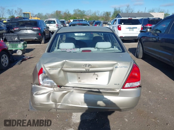 2003 Hyundai Elantra GLS z VIN KMHDN45D93U495703, wystawiony jako IAAI lot #42137927 z przebiegiem 93 287 mil mil oraz . Historia ofert i sprzedaży dostępna na DreamBid. Obrazek 16.