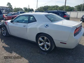 2014 Dodge Challenger R/T with VIN 2C3CDYBT6EH185590, listed as a IAAI auction lot 42536813 with 198,854 mi miles and . Bid and sale history available at DreamBid. Image 3.