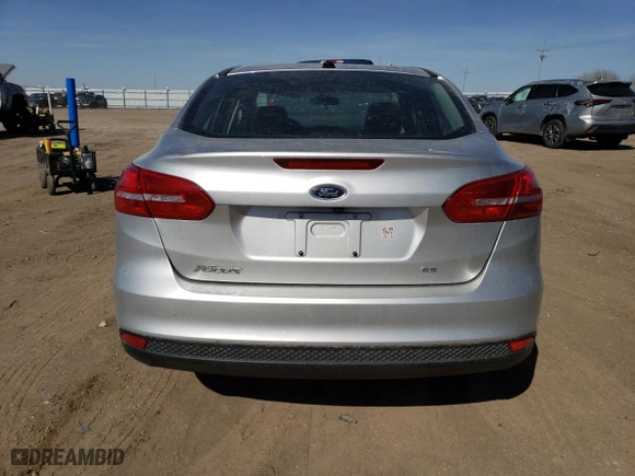 2018 Ford Focus SE with VIN 1FADP3FE5JL241561, listed as a Copart auction lot 48403005 with 67,617 mi miles and Salvage Title. Bid and sale history available at carsss.com. Image 6.
