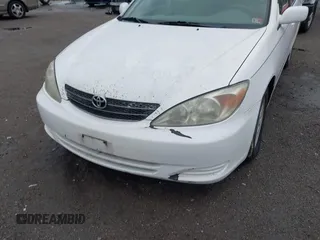 2003 Toyota Camry LE z VIN 4T1BF30K93U044730, wystawiony jako IAAI lot #42044599 z przebiegiem 120 401 mil mil oraz . Historia ofert i sprzedaży dostępna na DreamBid. Obrazek 6.