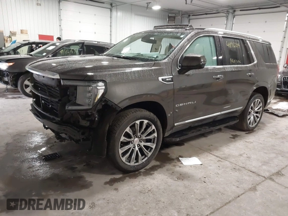 2021 GMC Yukon Denali with VIN 1GKS2DKL8MR409483, listed as a IAAI auction lot 41196214 with 62,684 mi miles. Bid and sale history available at carsss.com. Image 2.