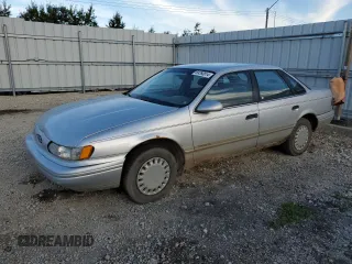 1993 Ford Taurus GL z VIN 1FALP52U6PG231014, wystawiony jako Copart lot #69260814 z przebiegiem 156 668 mil mil oraz Szkoda całkowita • Salvage title. Historia ofert i sprzedaży dostępna na DreamBid. Obrazek 1.