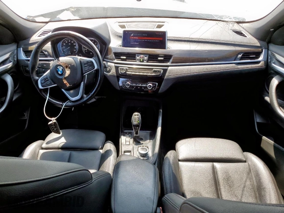 2020 BMW X2 sDrive28i with VIN WBXYH9C0XL5P59325, listed as a Copart auction lot 57661505 with 49,551 mi miles and Salvage title. Bid and sale history available at DreamBid. Image 8.