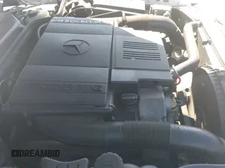 1998 Mercedes-Benz SL 500 with VIN WDBFA67F4WF157961, listed as a IAAI auction lot 43209136 with 134,570 mi miles and . Bid and sale history available at DreamBid. Image 12.