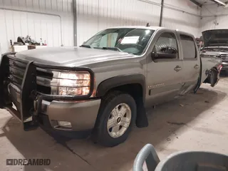 2008 Chevrolet Silverado 1500 LTZ with VIN 3GCEK13318G298836, listed as a IAAI auction lot 41183164 with 157,940 mi miles. Bid and sale history available at carsss.com. Image 2.