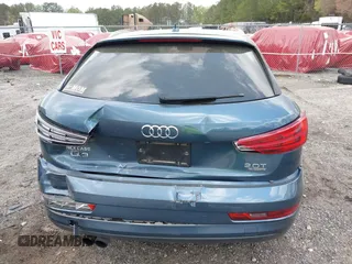 2018 Audi Q3 Premium Plus z VIN WA1JCCFS8JR014631, wystawiony jako IAAI lot #41958696 z przebiegiem 94 063 mil mil oraz . Historia ofert i sprzedaży dostępna na DreamBid. Obrazek 16.