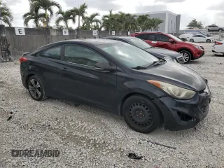 2013 Hyundai Elantra Coupe SE with VIN KMHDH6AE7DU006587, listed as a Copart auction lot 51184105 with 156,546 mi miles and Clean Title. Bid and sale history available at carsss.com. Image 4.
