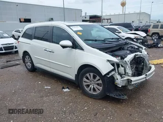2016 Honda Odyssey EX-L z VIN 5FNRL5H61GB030771, wystawiony jako IAAI lot #42459561 z przebiegiem 130 541 mil mil oraz . Historia ofert i sprzedaży dostępna na DreamBid. Obrazek 1.