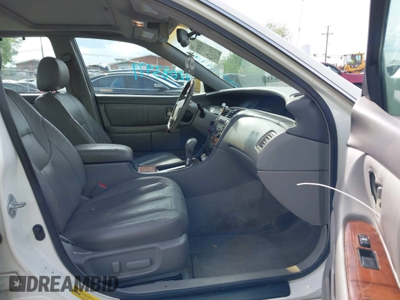 2003 Toyota Avalon XL with VIN 4T1BF28B73U321678, listed as a IAAI auction lot 42083979 with 283,606 mi miles and . Bid and sale history available at carsss.com. Image 5.