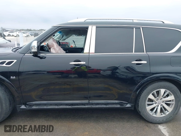 2015 Infiniti QX80 with VIN JN8AZ2NF2F9573817, listed as a IAAI auction lot 41640980 with 141,945 mi miles and . Bid and sale history available at DreamBid. Image 14.