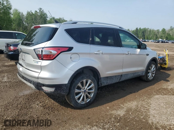 2018 Ford Escape Titanium с VIN 1FMCU9J9XJUD44928, выставлен на аукционе Copart как лот 59675445 с пробегом 37 485 миль миль и Чистый • Clean title. История ставок и продаж доступна на DreamBid. Изображение 3.