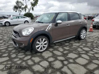2015 MINI Countryman S with VIN WMWZC3C55FWT02233, listed as a Copart auction lot 55840685 with 60,652 mi miles and Salvage title. Bid and sale history available at DreamBid. Image 1.