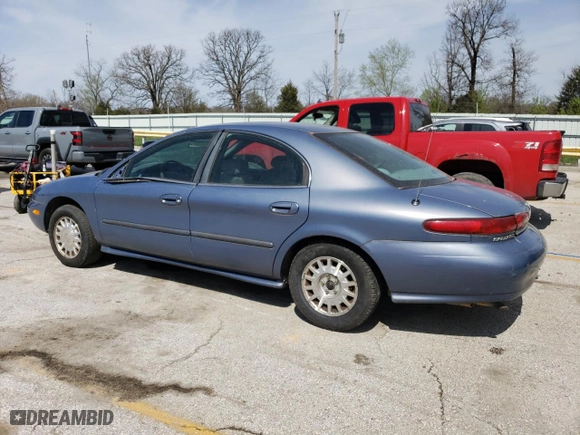 1999 Mercury Sable GS with VIN 1MEFM50U1XA653292, listed as a Copart auction lot 51307905 with 210,945 mi miles and Salvage Title. Bid and sale history available at carsss.com. Image 2.